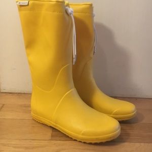 • tretorn • yellow tall draw string rain boots